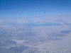 千歳上空から大きく右へ/日本海と小樽，札幌が見えます