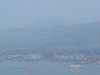 函館山からの眺め(4)/うっすらと見える駒ヶ岳と函館港を進むフェリー