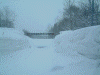 冬季通行止めのため除雪されずにいる県道