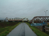 最上川橋梁を渡り終えた山形鉄道 フラワー長井線のレールバス